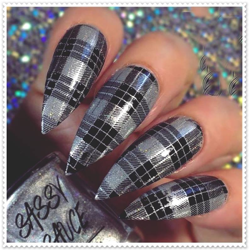 silver and black fancy nail art design
