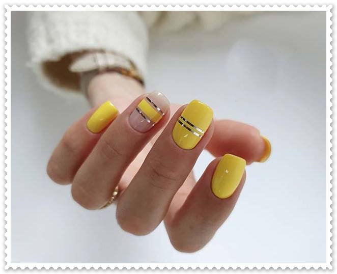 Trendy-Yellow-Nails-with-Silver-Stripes-fancynailart.com